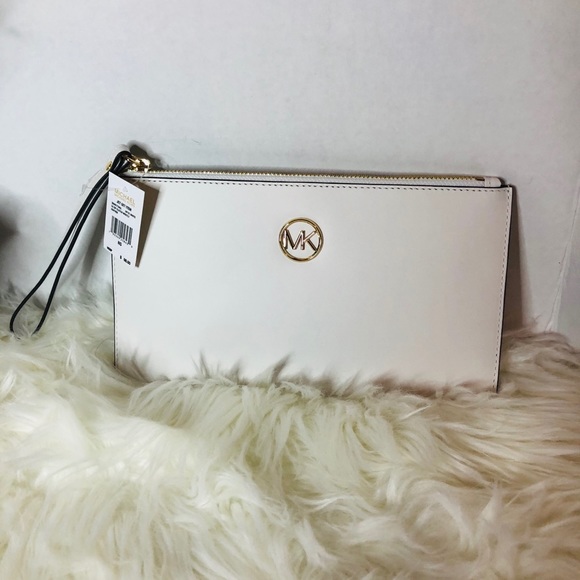 Michael Kors Handbags - Michael Kors large zip clutch wristlet in white